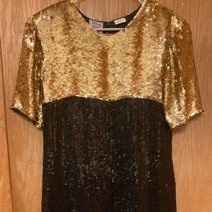 Vintage Stenay sequin dress! Black and gold sequins with a cool back and slit